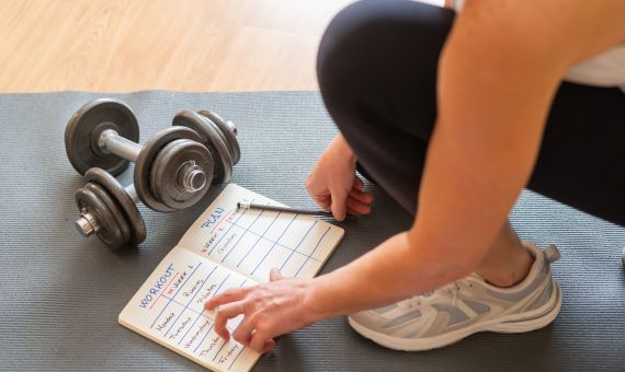 a woman making her protein drink