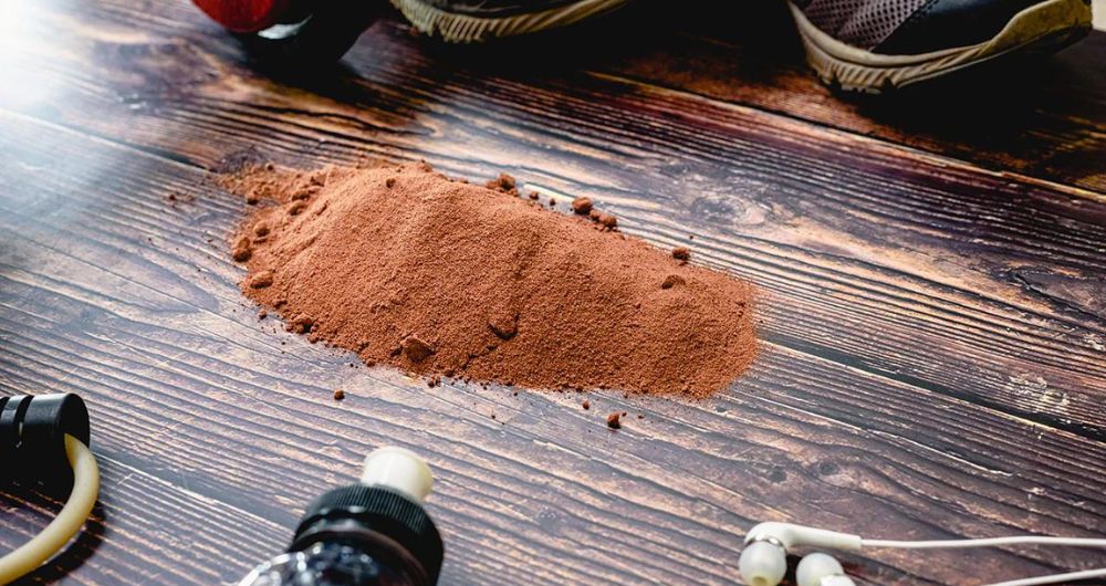 Chocolate Protein Powder and fitness-oriented background, emphasizing fitness nutrition.